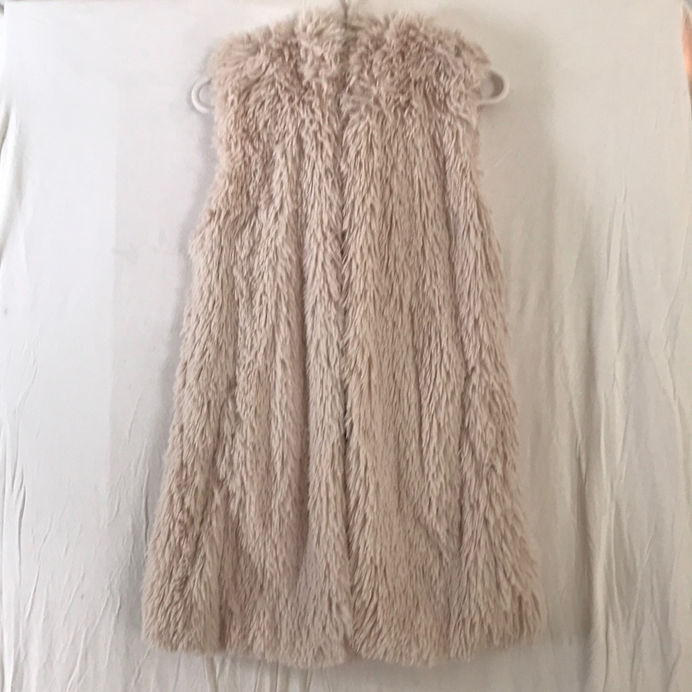 Fluffy pink vest